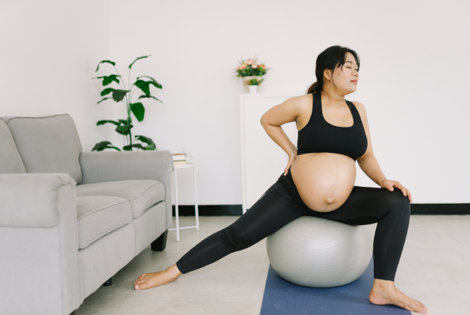 mom holding her newborn in her 4th trimester wondering how to start healing her body from birth and reconnecting with her partner