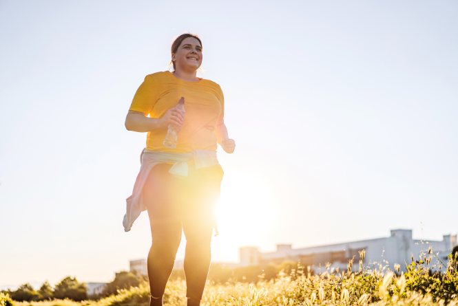 postpartum new mom running for the first time after having a baby